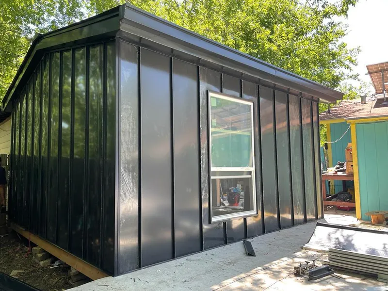 Black standing seam metal wall panels for Metal Roof Installation in Bay City