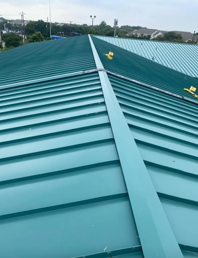 Green commercial metal roof ridge and valley for Metal Roof Repair in Bay City